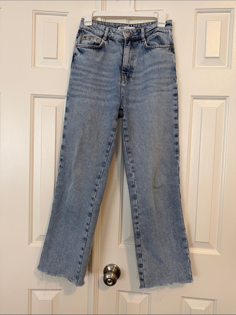 Zara Light Blue Flare Jeans with Raw Hem